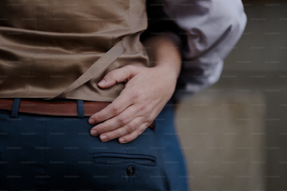 a person with their hands on their stomach