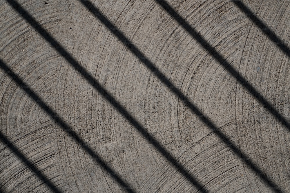 a close up of a wooden surface with bars on it