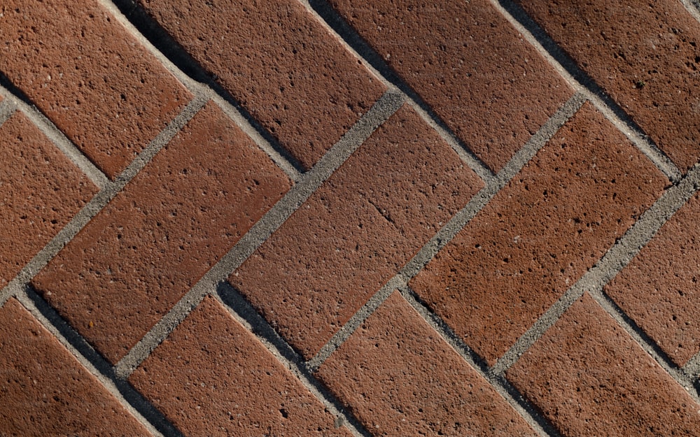 a close up of a brick wall made of bricks