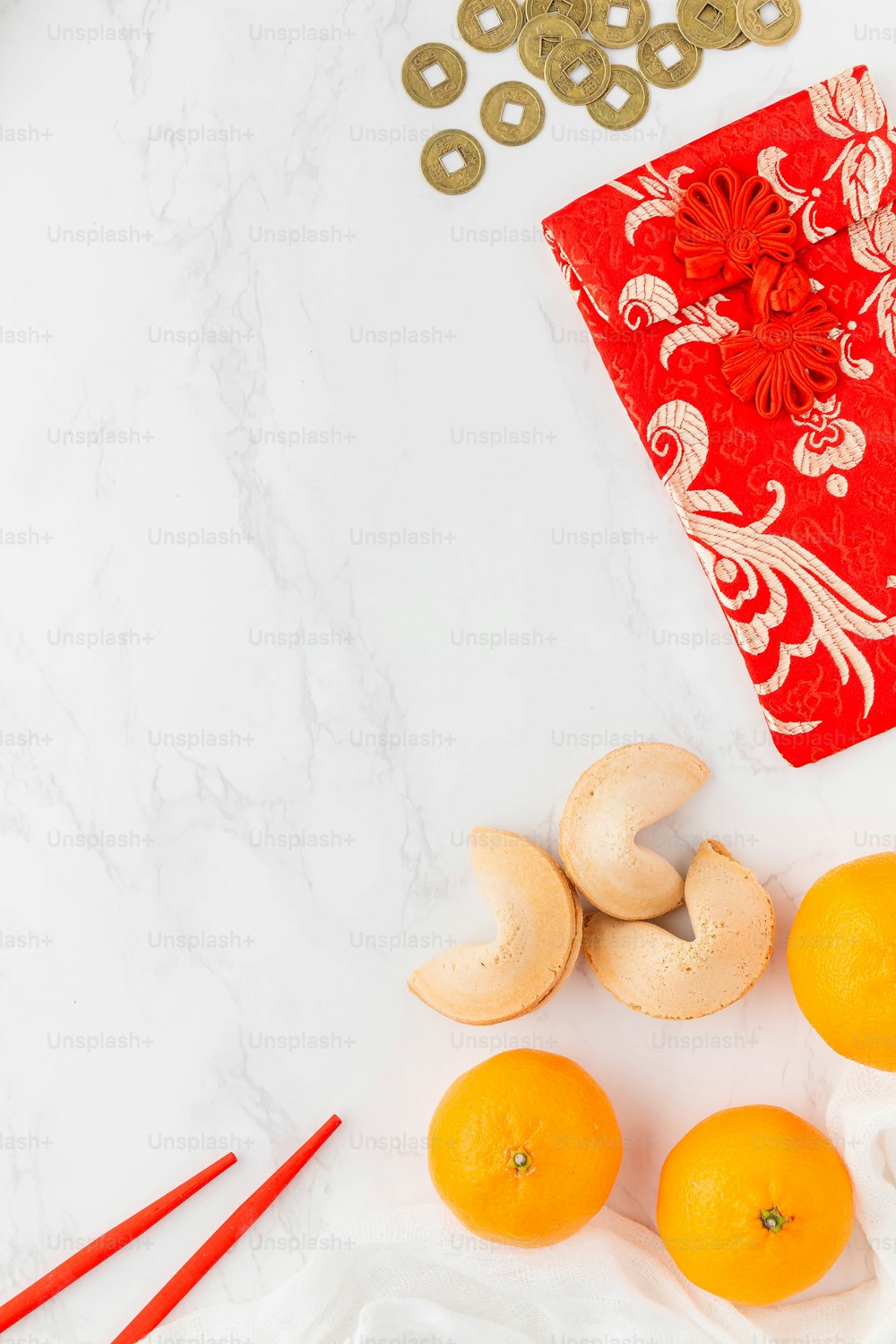 a table with oranges and other items on it