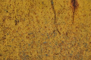 a close up of a rusted metal surface