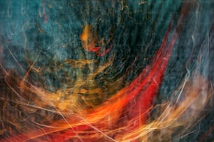 a blurry image of a red and yellow object