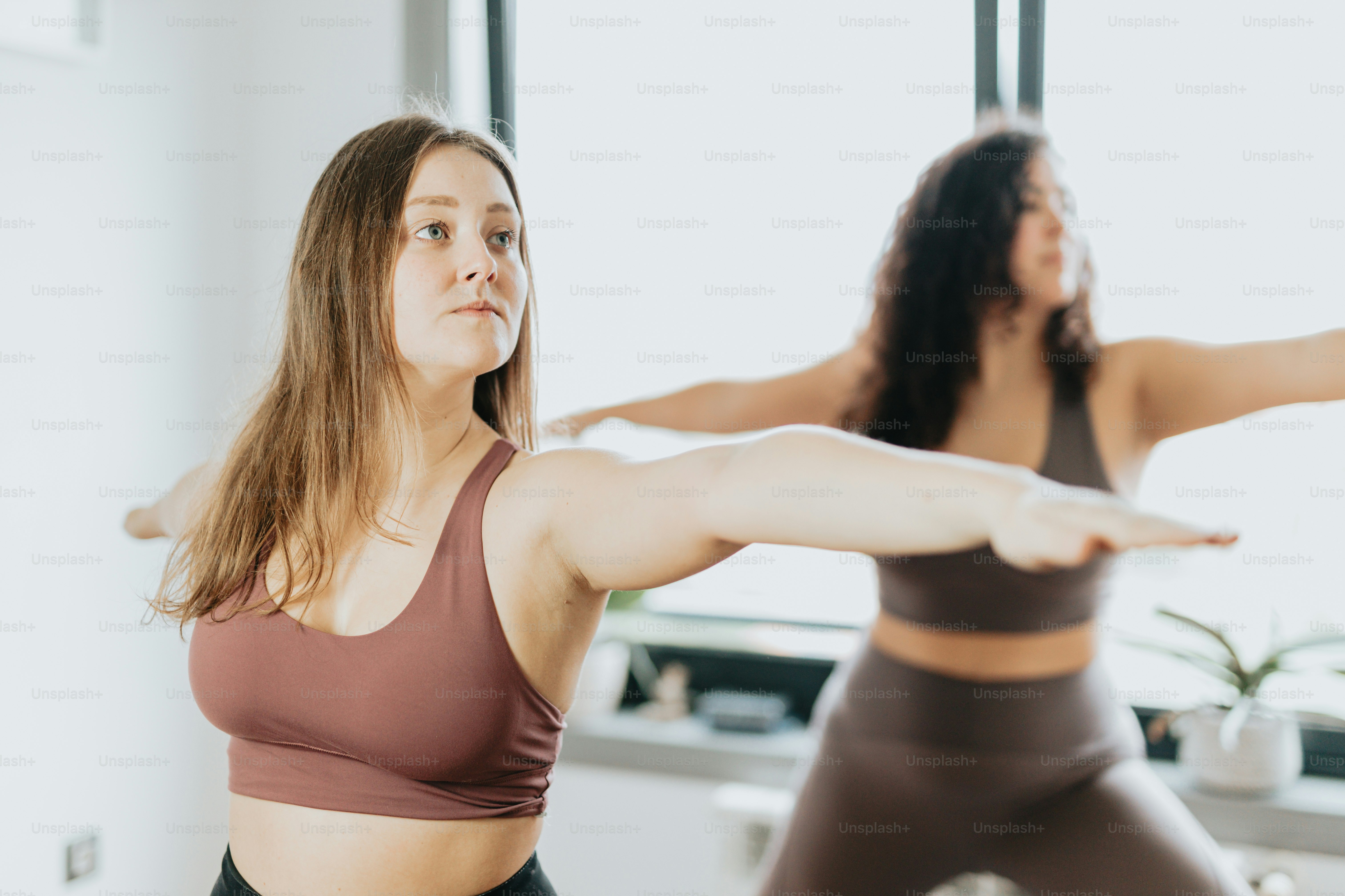 a couple of women standing in a room