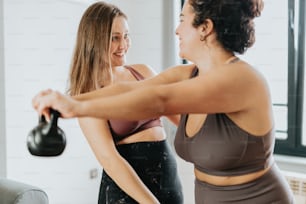 a couple of women standing next to each other