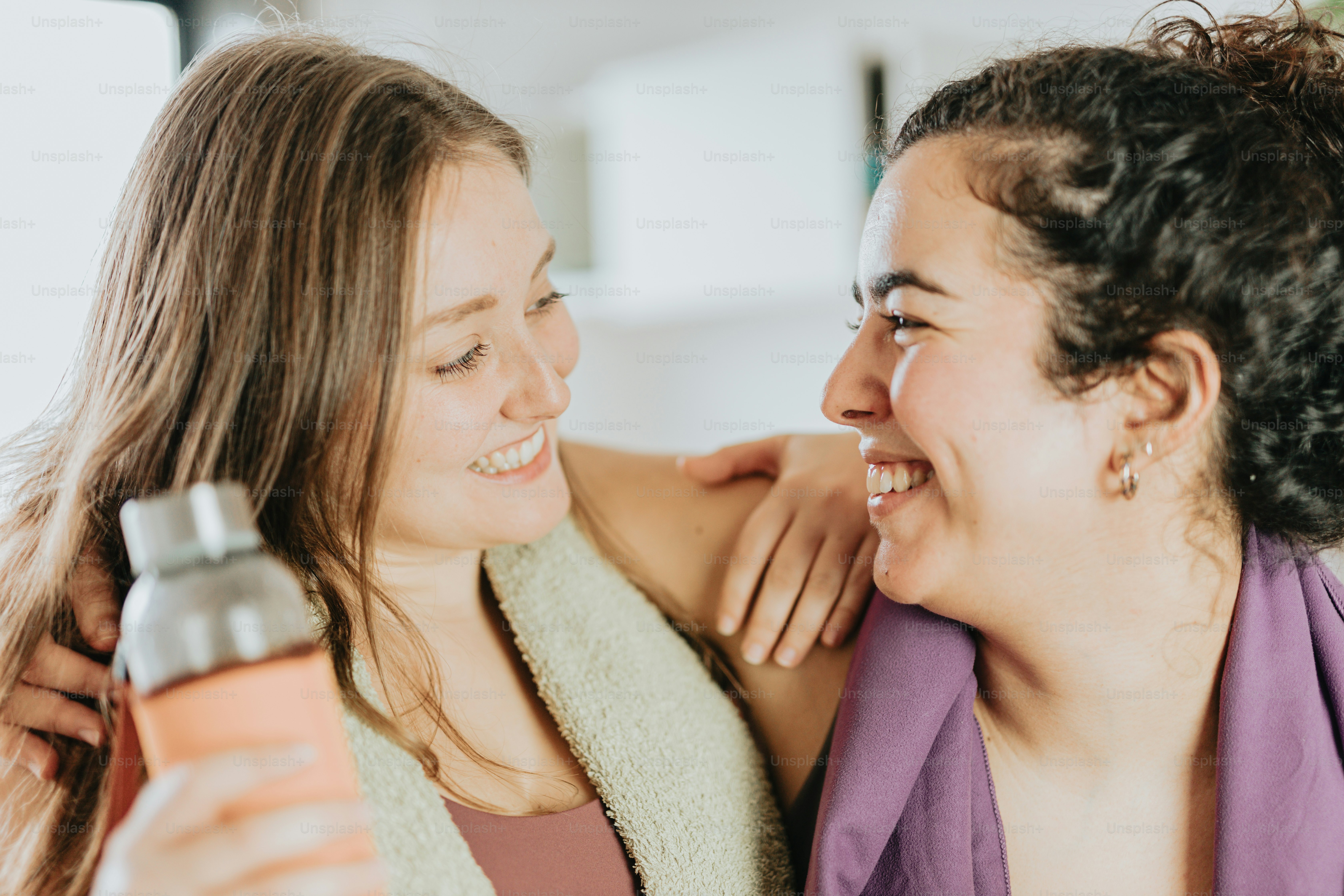 a couple of women standing next to each other