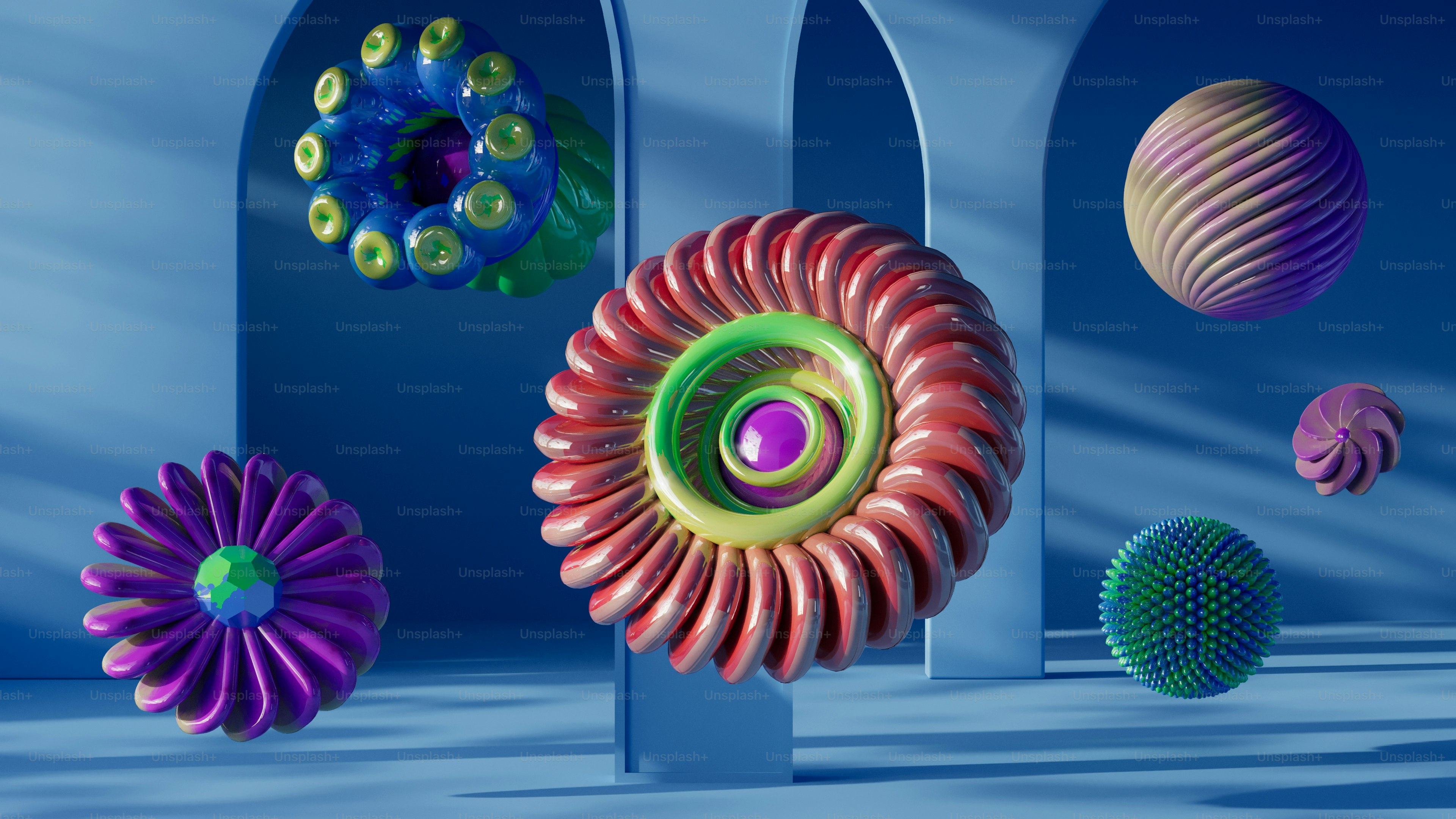 A group of colorful objects floating in the air photo – Abstract Image ...