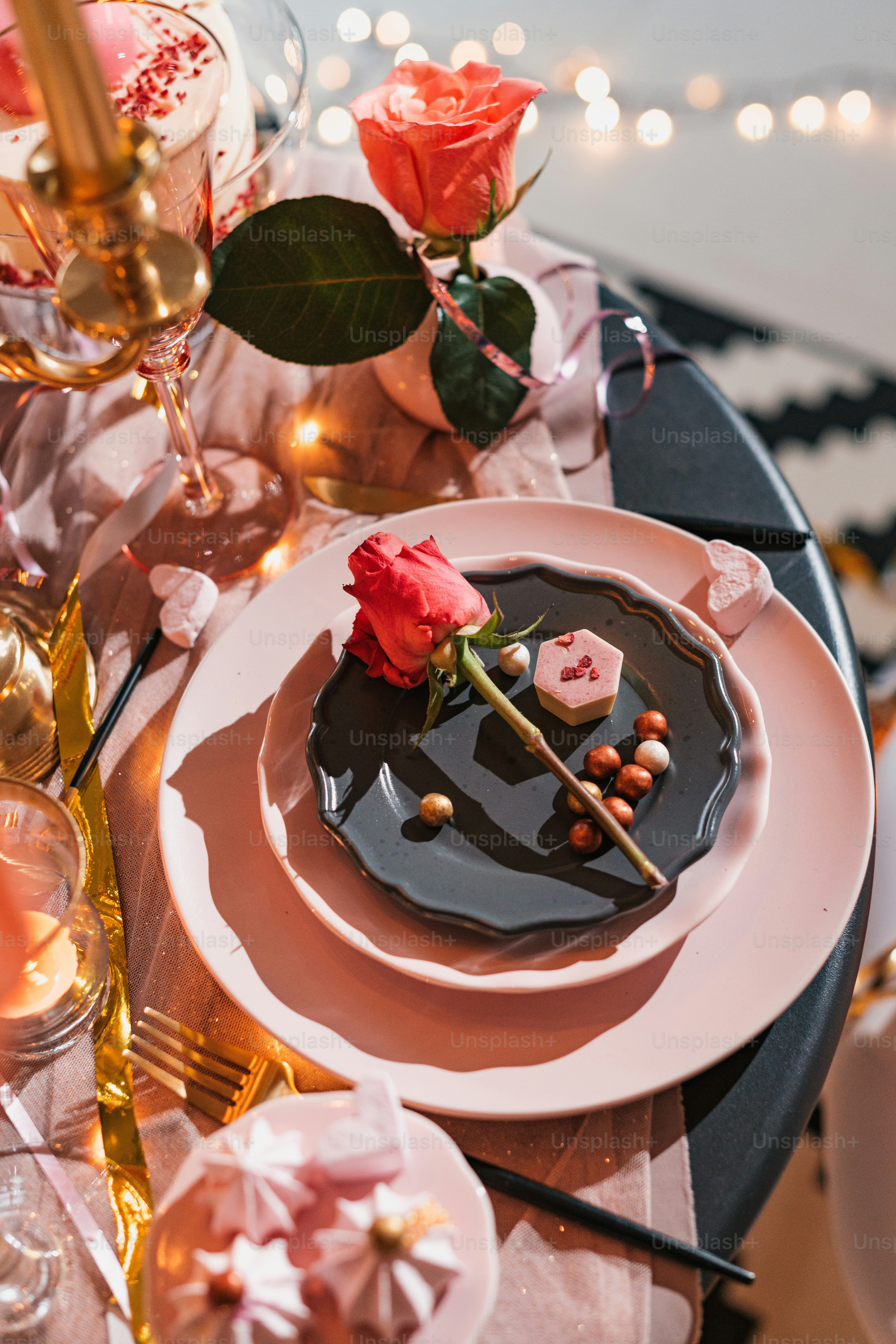 a chocolate cake with a rose on top of it