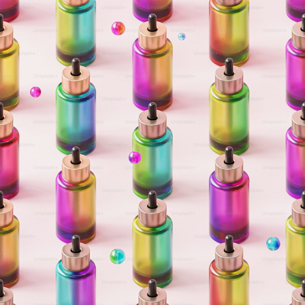 a multicolored pattern of spray cans and bubbles