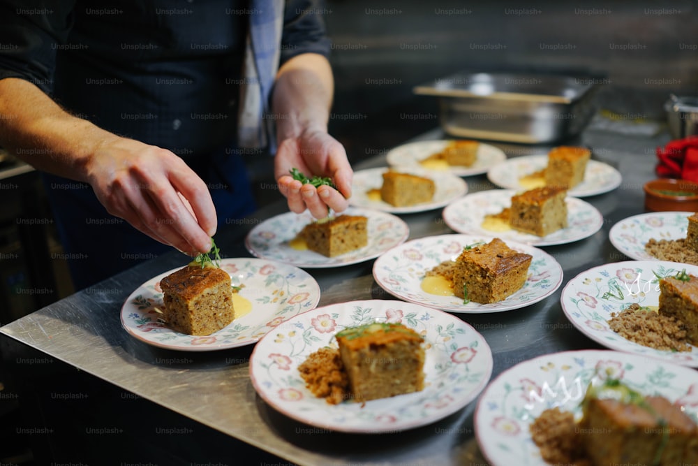 a person putting a piece of cake on a plate