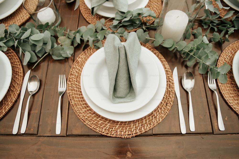 a place setting with place settings and place settings