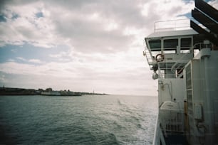 a boat traveling across a large body of water