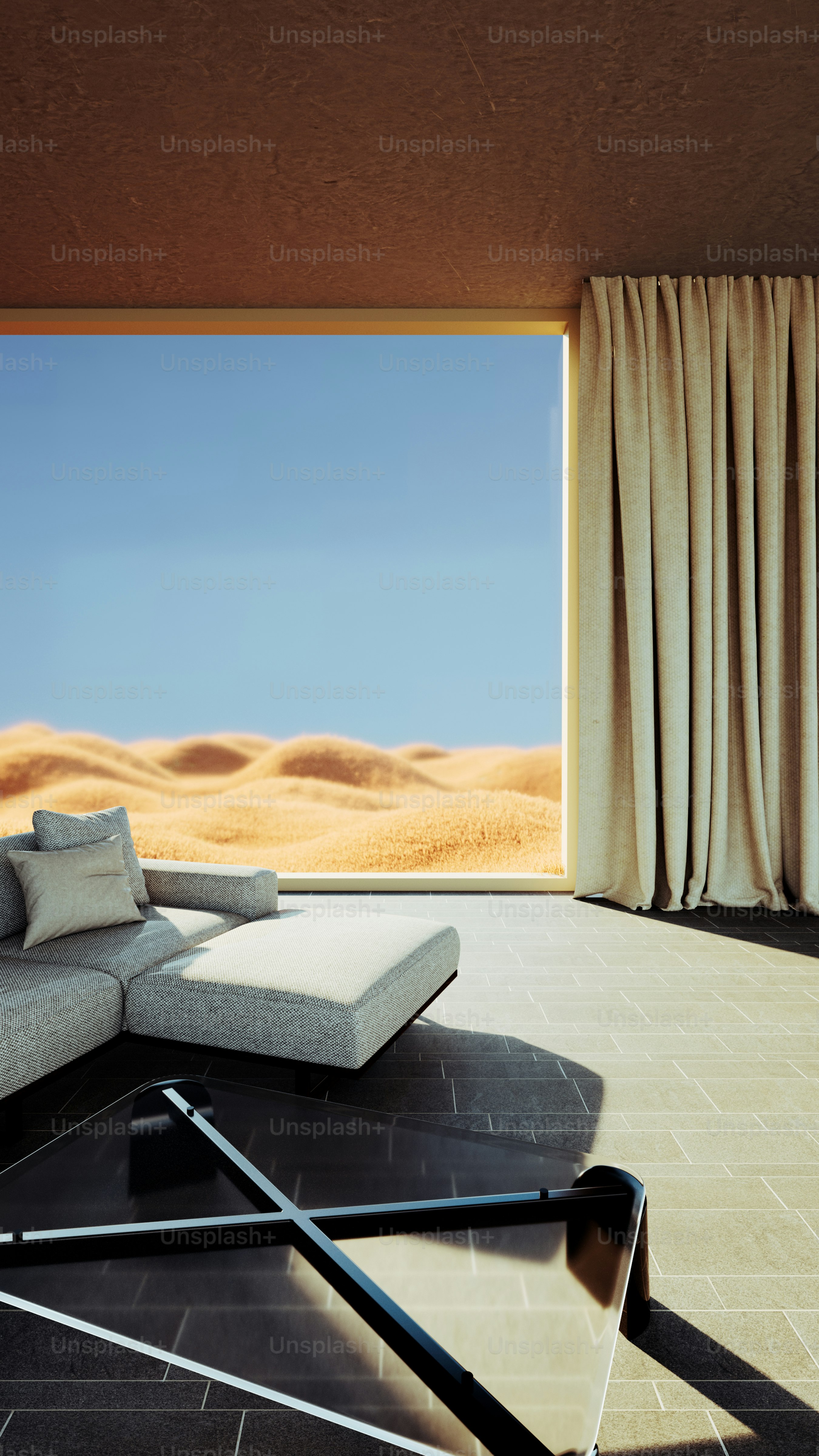 un canapé assis au-dessus d’un étage à côté d’une fenêtre