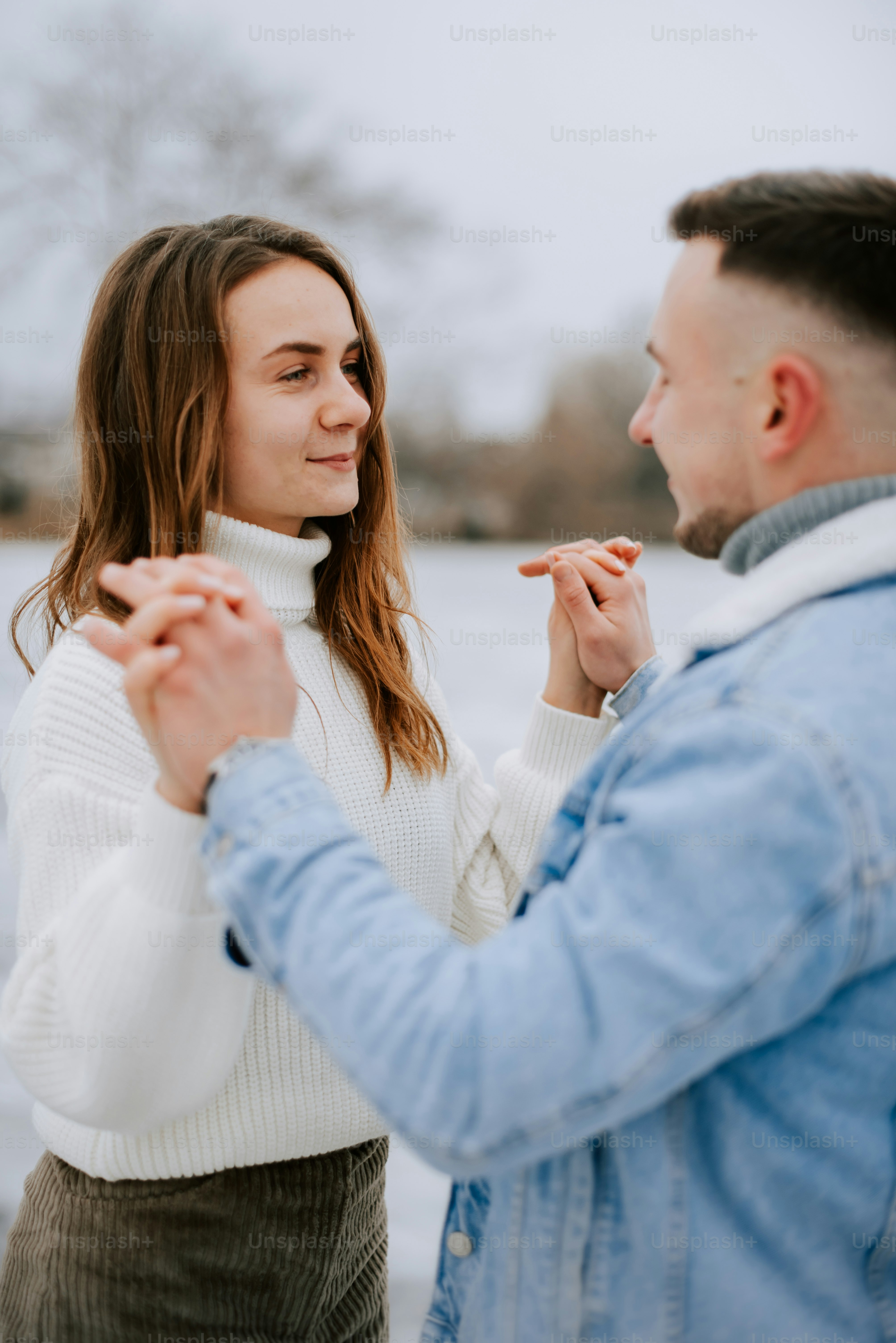 a man and a woman standing next to each other