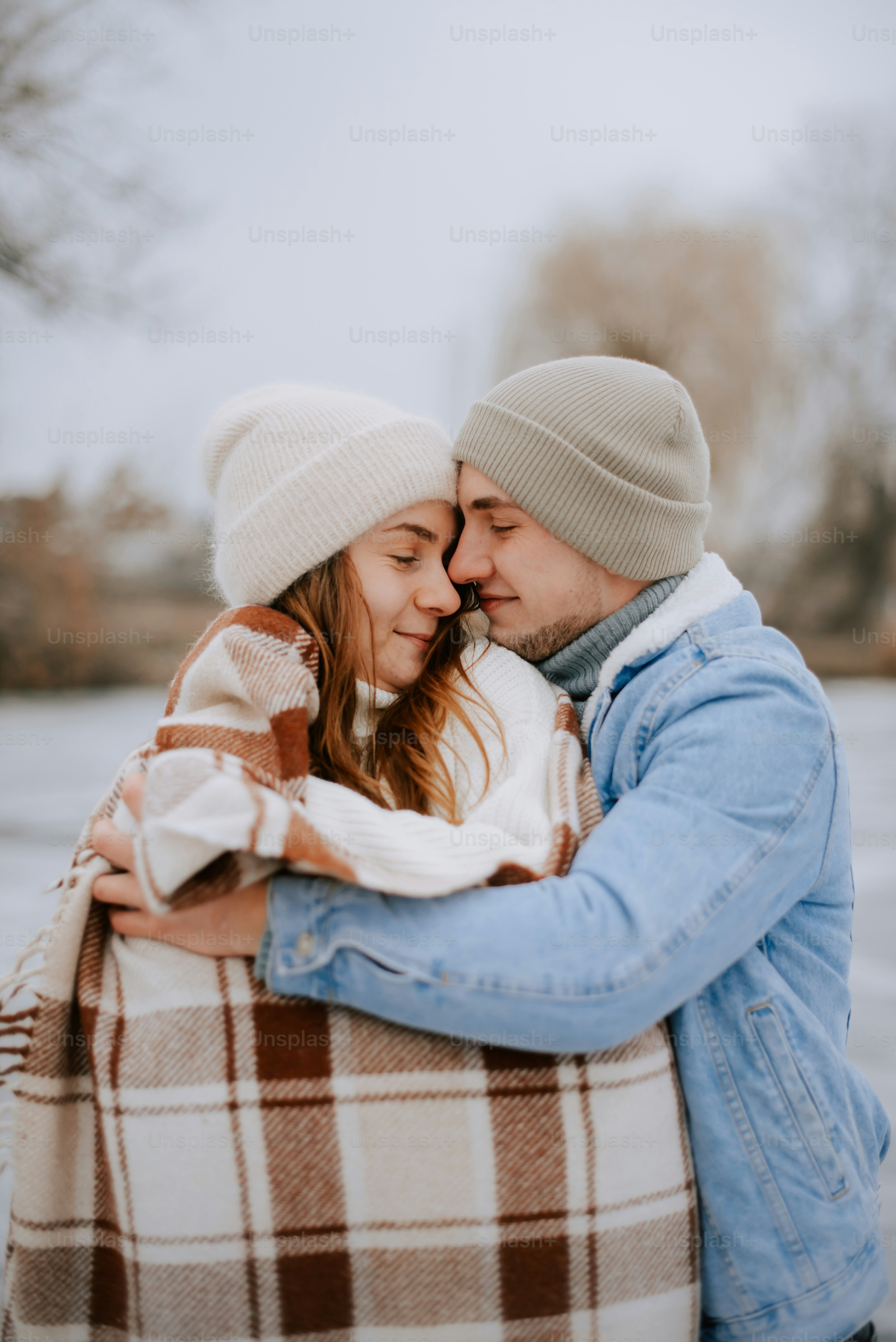 a man and a woman hugging each other