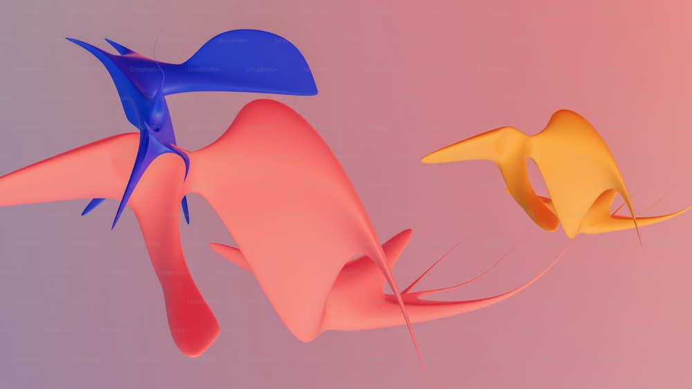 Drei verschiedenfarbige Objekte fliegen in der Luft