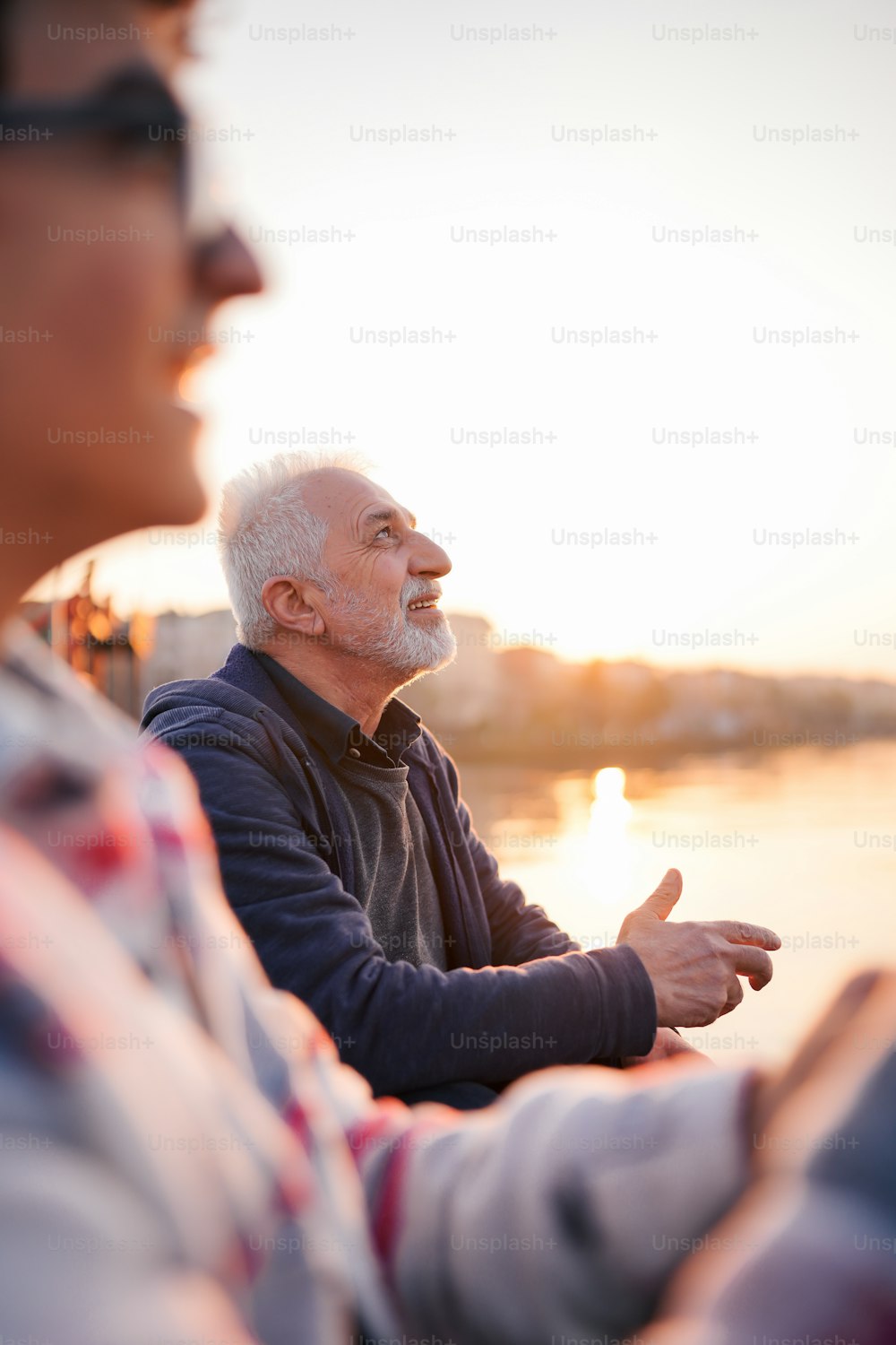 two older men sitting next to each other