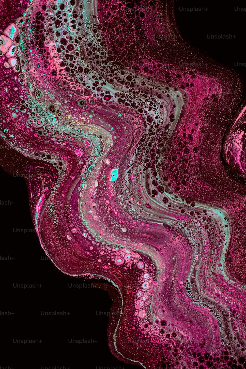 an abstract painting with pink and green colors