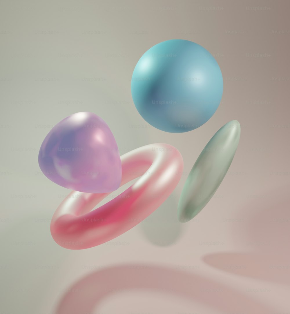Un grupo de tres globos flotando en el aire