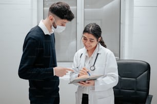 a man and a woman in a doctor's office