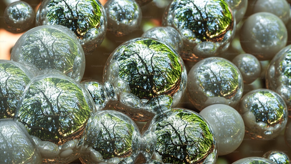 a bunch of shiny balls with trees on them