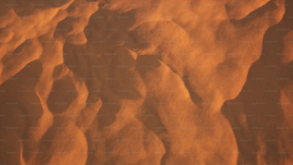 a view of the sand from a plane window