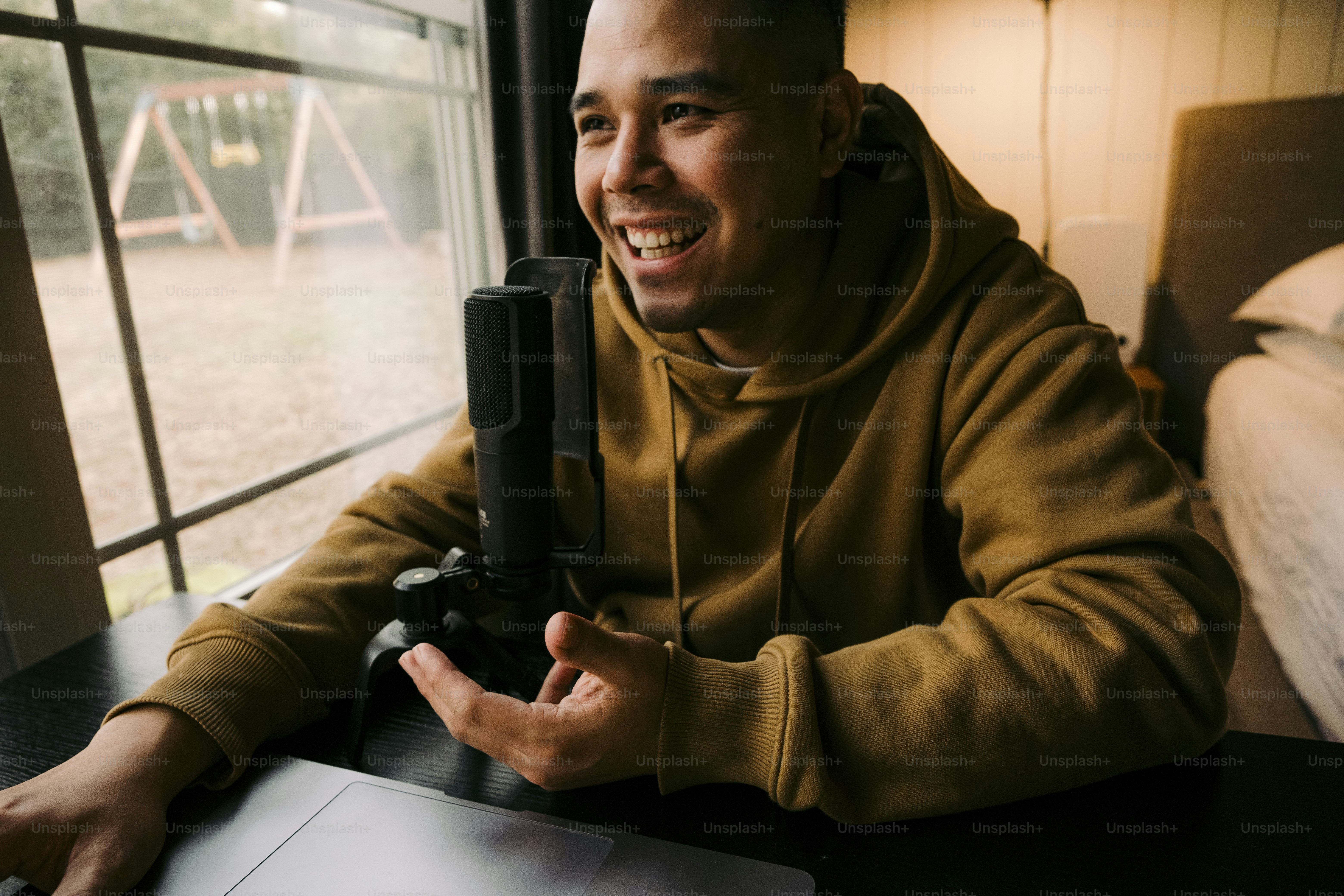 a man sitting in front of a laptop computer