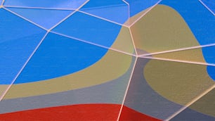a close up of a blue and red umbrella