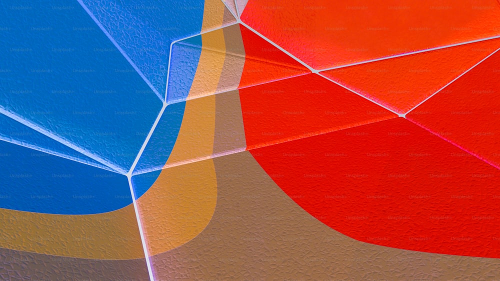 a close up of a colorful umbrella with a white background