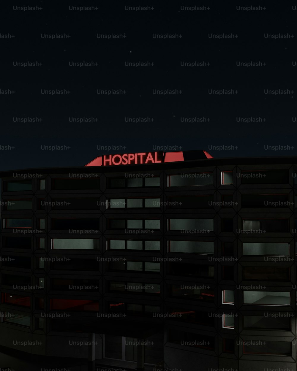 a hospital building lit up at night time
