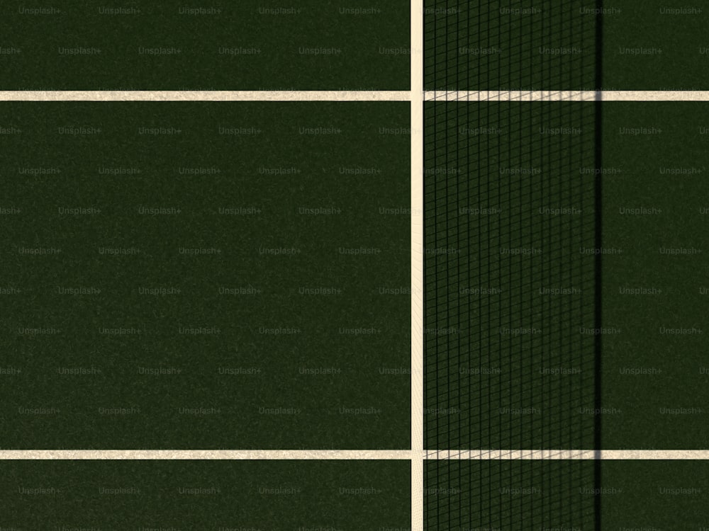 a close up of a tennis court with a net