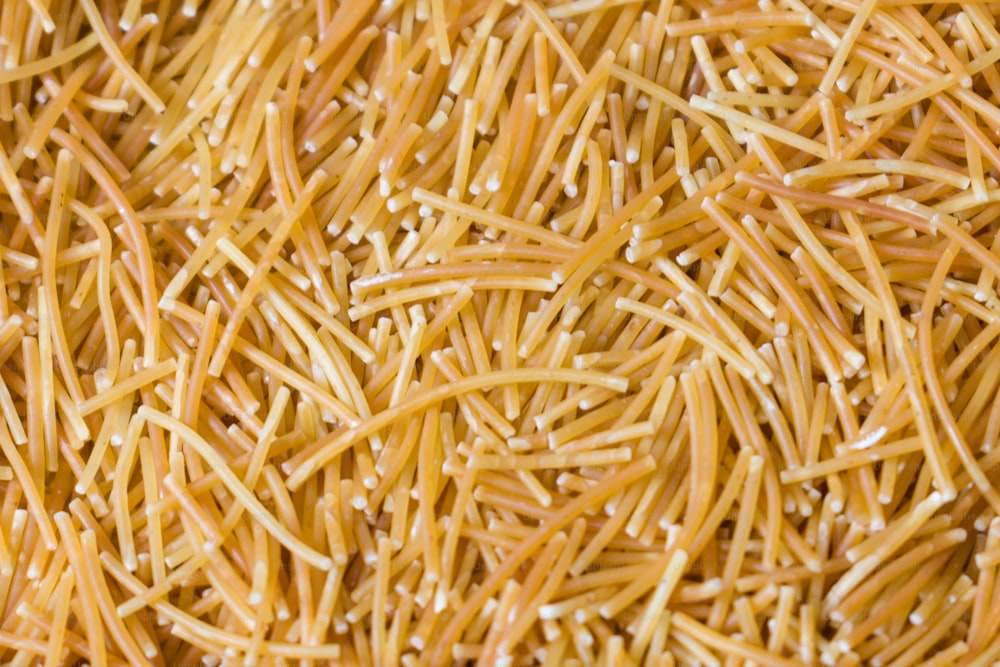 a close up of a bunch of noodles