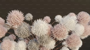 a bunch of white and pink flowers in a vase