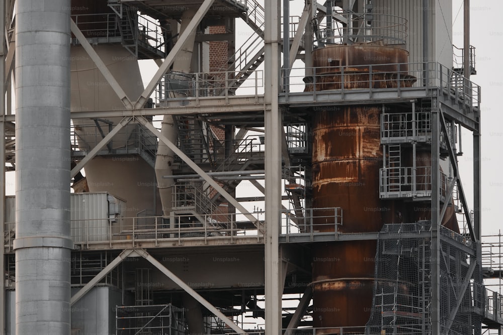 a large metal structure with lots of pipes