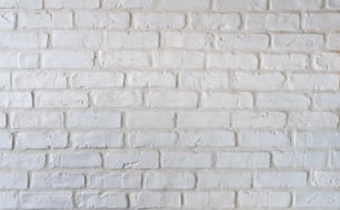 Gros plan d’un mur de briques blanches