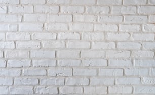 a close up of a white brick wall