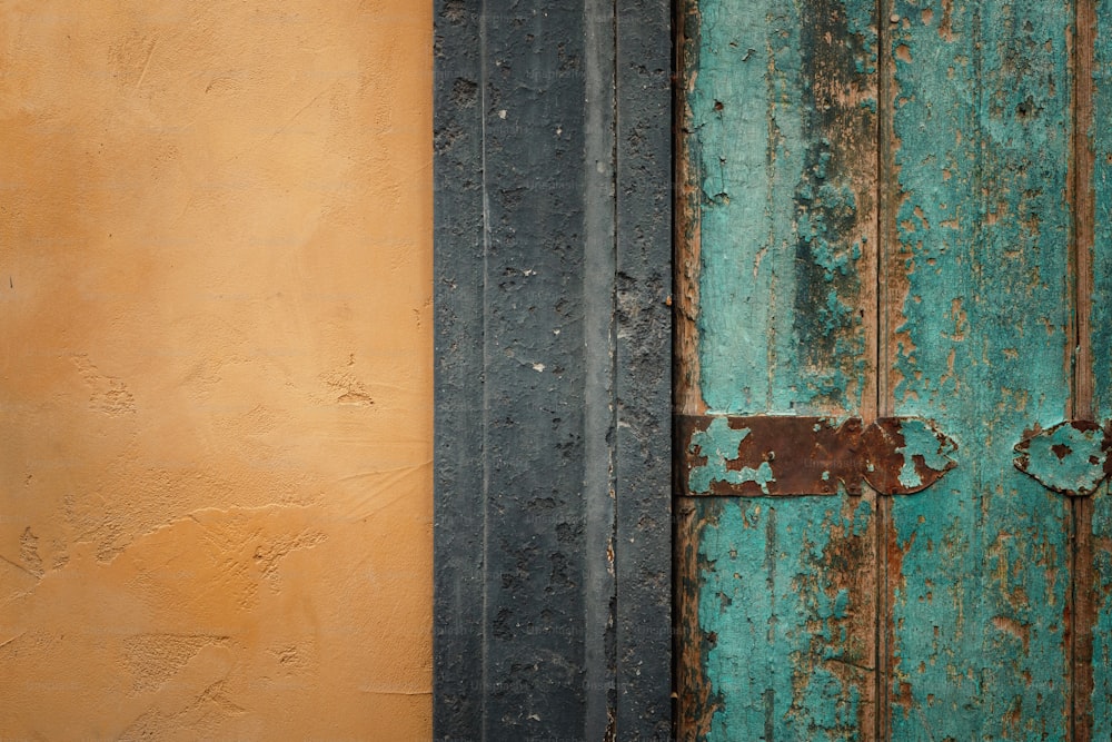 a close up of a rusted metal door