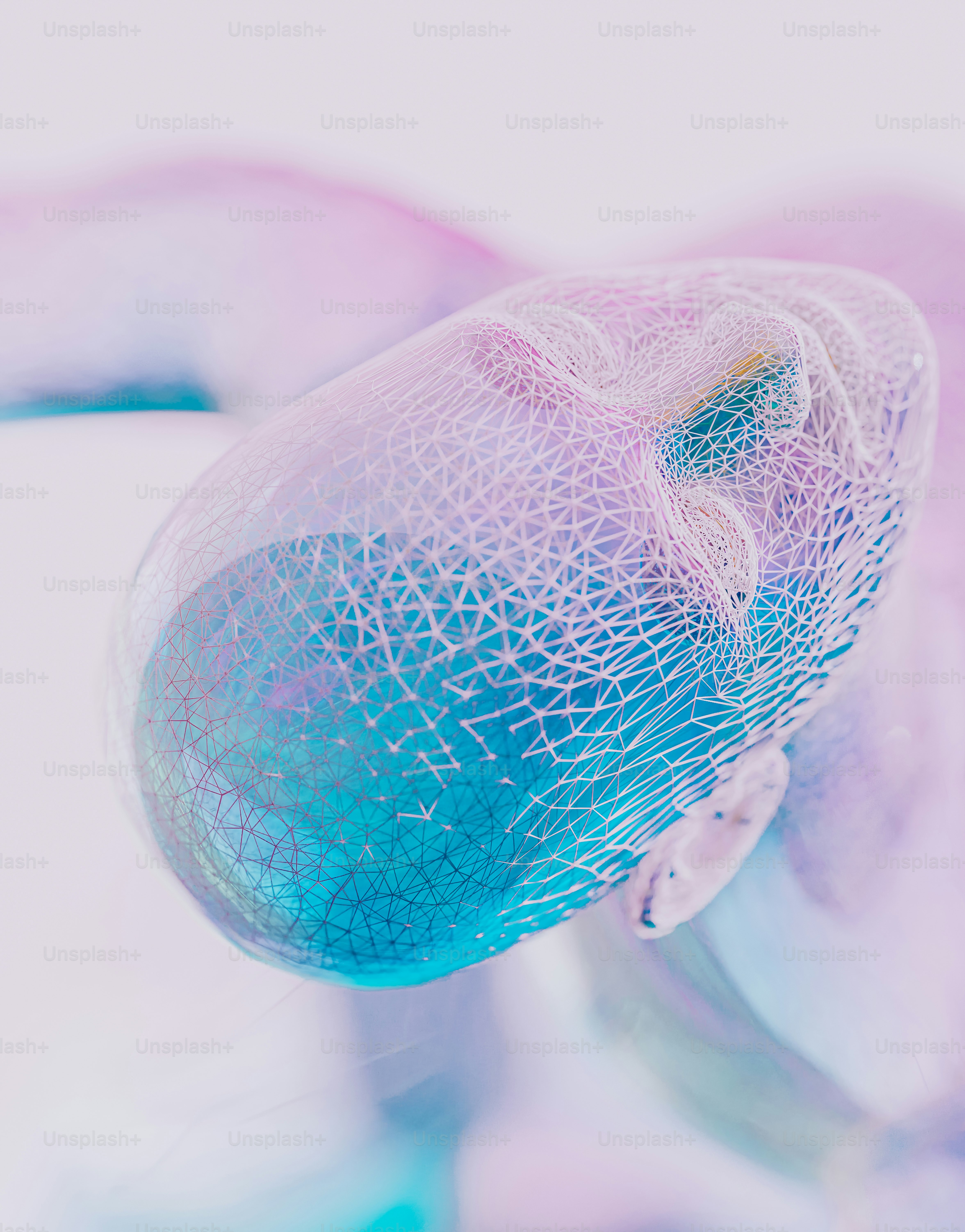 a close up of a blue and pink object