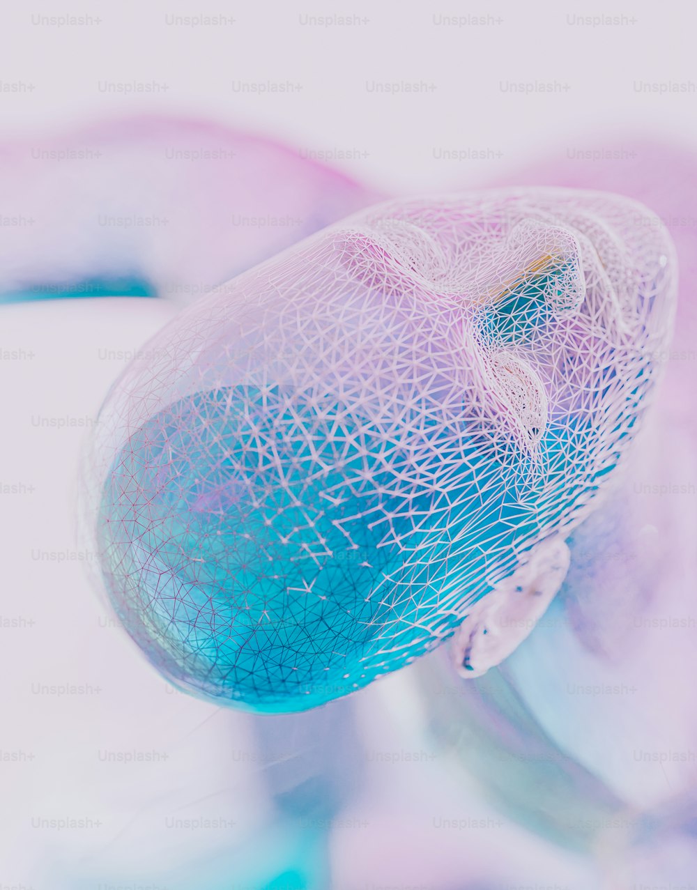 a close up of a blue and pink object