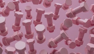 Ein Haufen rosa Schrauben sind in einem Muster angeordnet