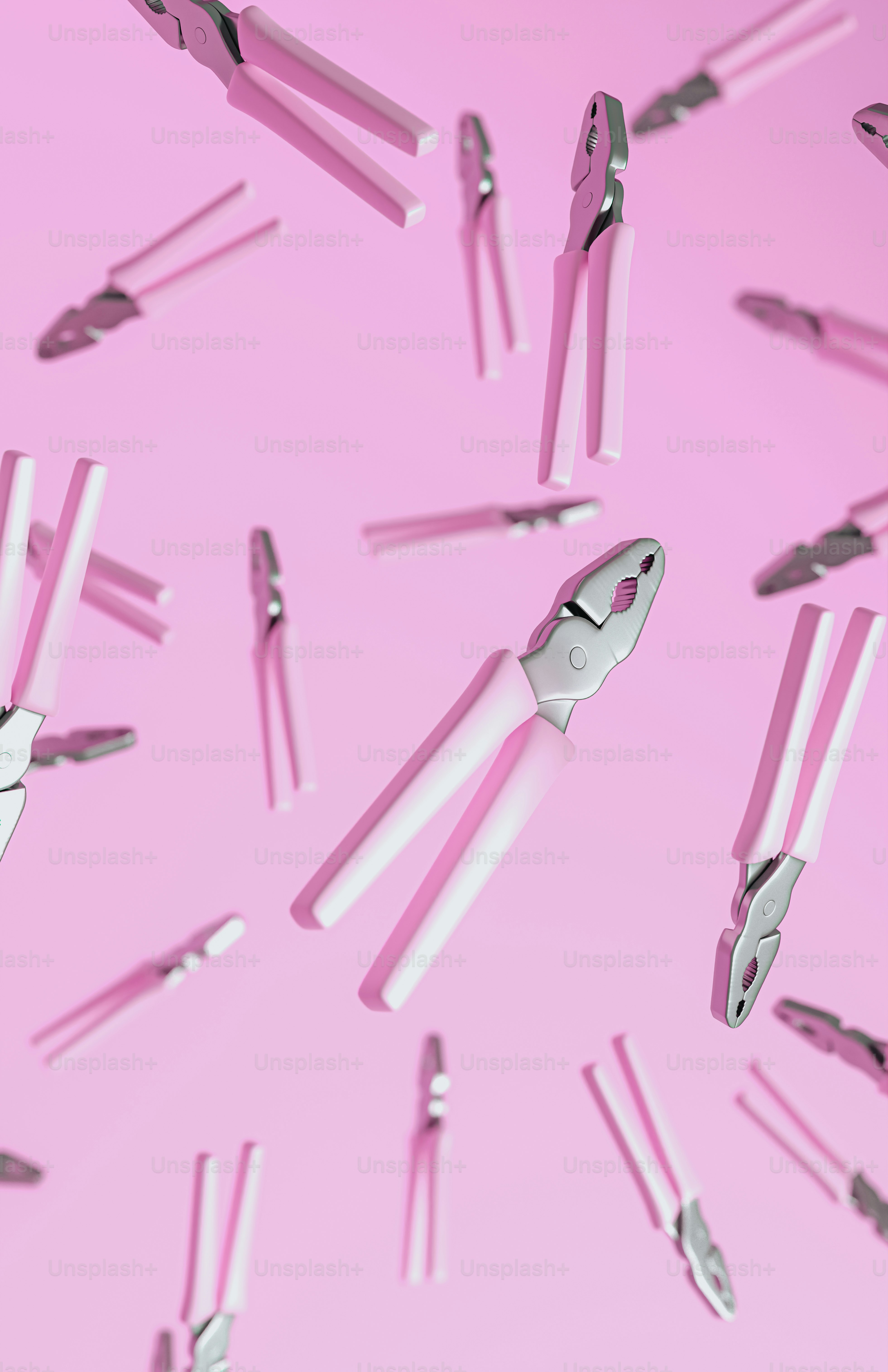 Eine Gruppe rosa Scheren fliegt durch die Luft