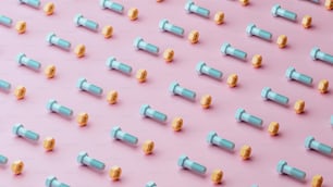 a pink background with a lot of blue and gold screws