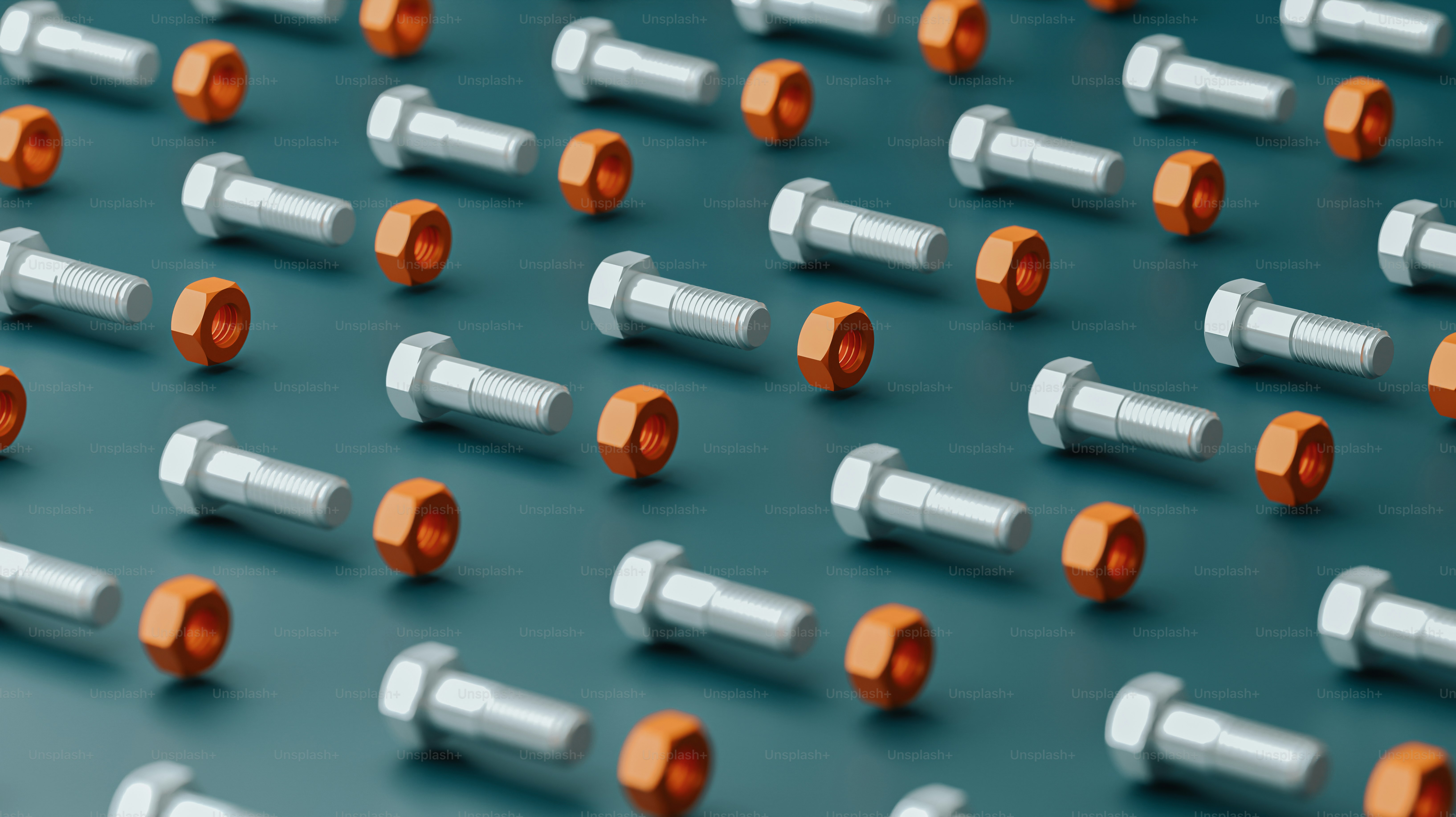 many orange and silver knobs on a blue surface