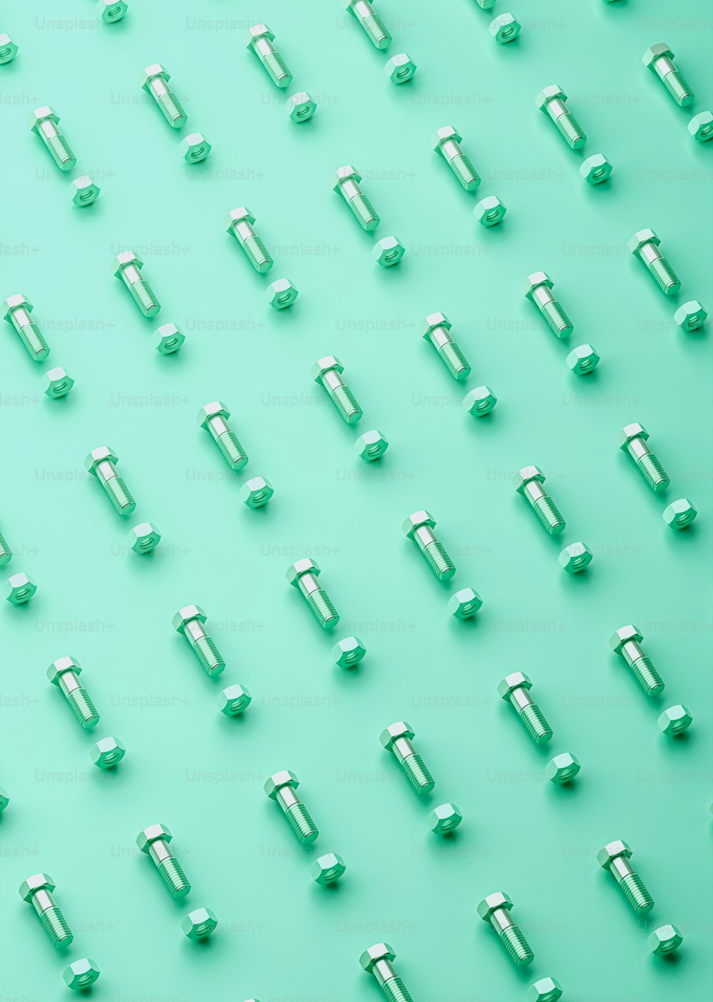a group of screws on a blue background