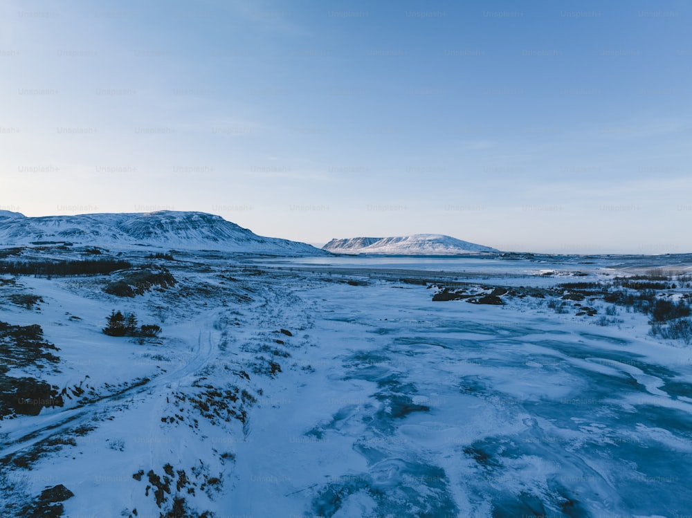 a river running through a snow covered landscape