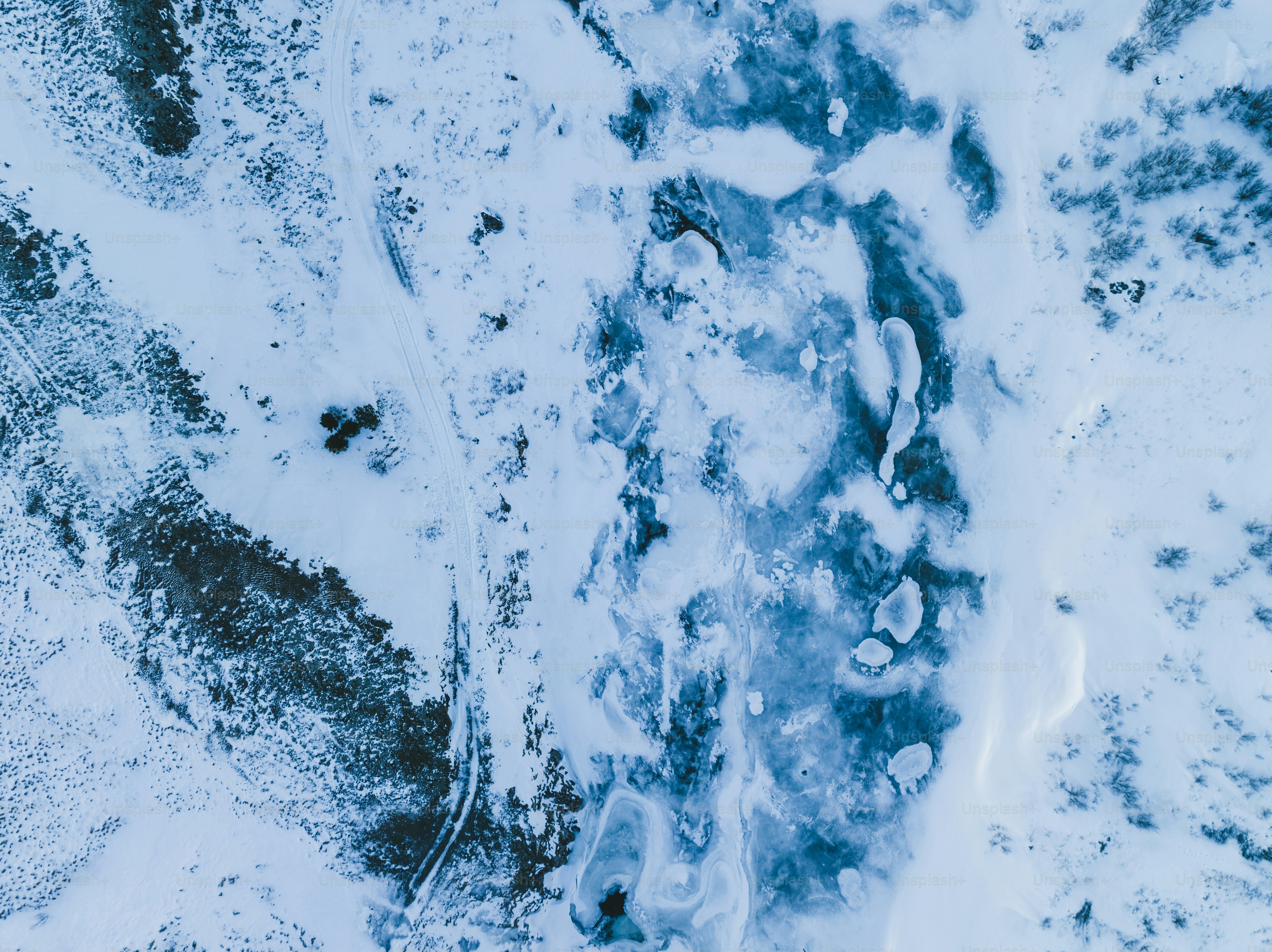 An aerial view of a snow covered area photo – Nature Image on Unsplash
