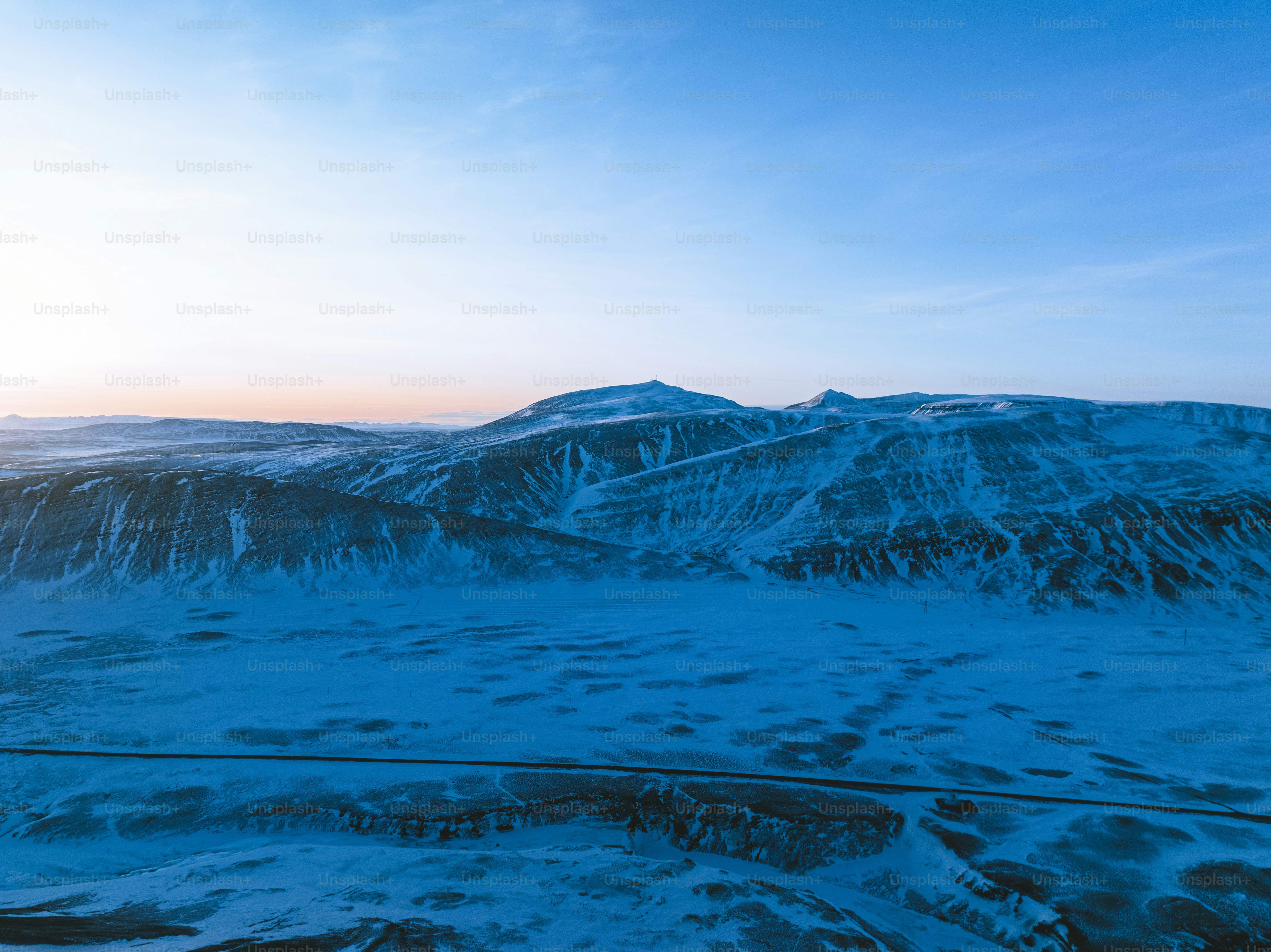 An aerial view of a snow covered area photo – Texture Image on Unsplash
