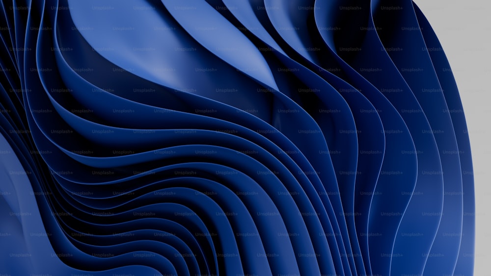 a close up of a blue object with wavy lines