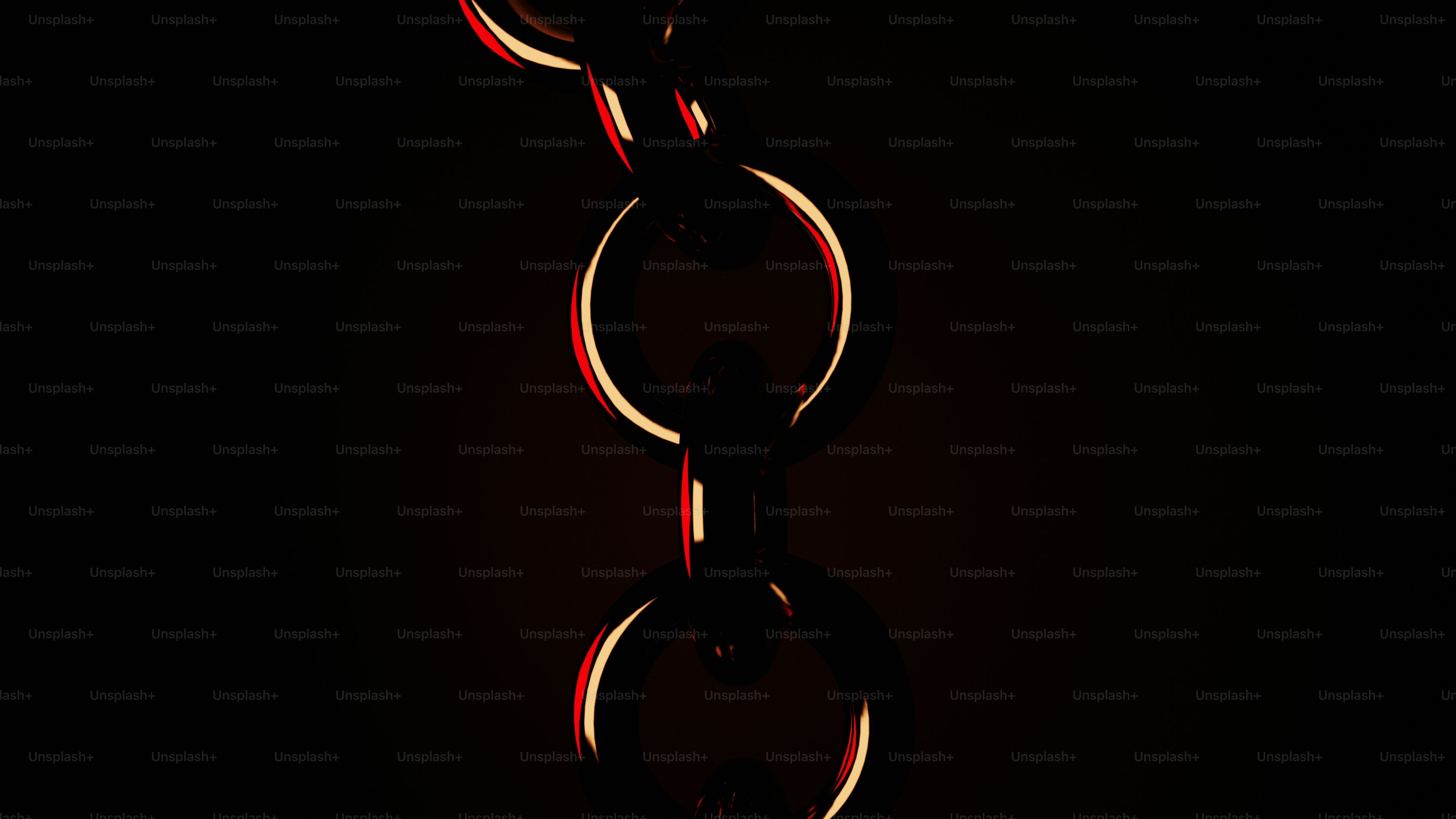 a red and black photo of a chain on a black background
