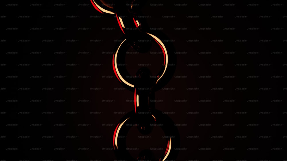 a red and black photo of a chain on a black background