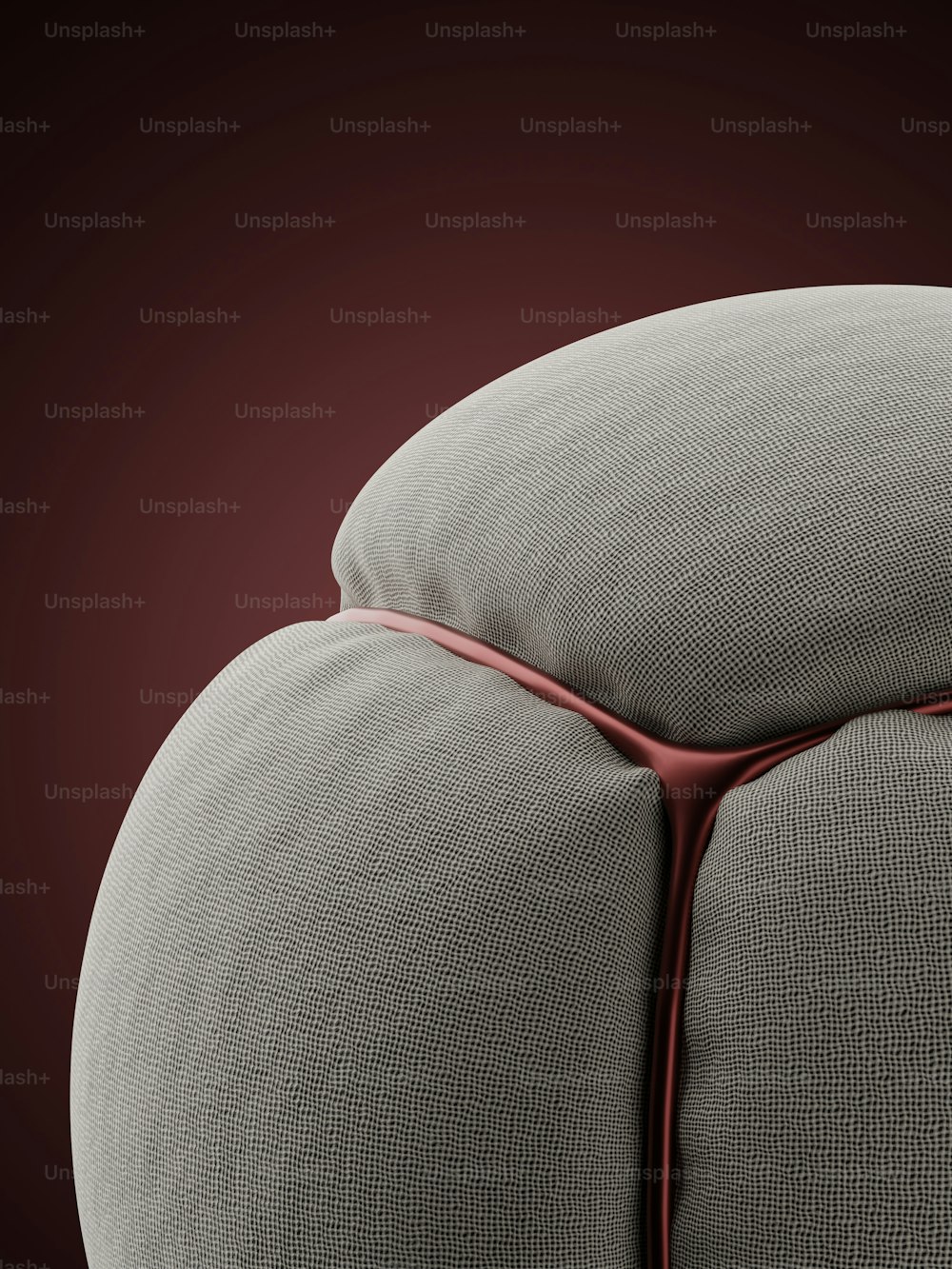 a close up of a cushion on a chair